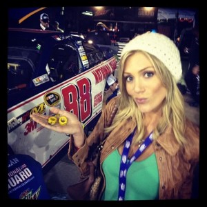 Rozlyn Papa holding Dale Earnhardt Jr's lug nuts in Richmond, Virginia